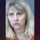 Woman sentenced for killing her husband, leaving his body wrapped in plastic underneath bed