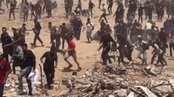 Dozens killed at Gaza aid site after shots fired into crowd