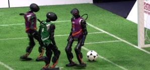Humanoid robots play soccer in China