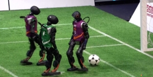 Humanoid robots play soccer in China