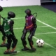 Humanoid robots play soccer in China