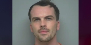Man who killed ex in front of her son, kept voodoo doll, and defaced photos of her is sentenced