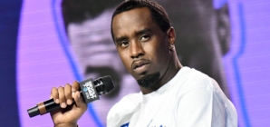 Sean Combs’ lawyers protest secrecy as a famous rapper is mentioned in trial