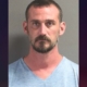 Man arrested after allegedly leaving son in hot car to die while he went drinking