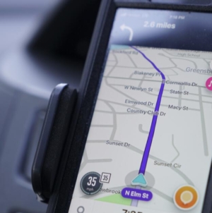 Holding your cellphone while driving is illegal, even for navigation, California court rules