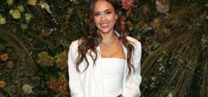Jessica Alba lounges poolside in bikini while promoting friendship and self-care