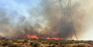Crews battling wind-driven fire in Southern California’s high desert make progress