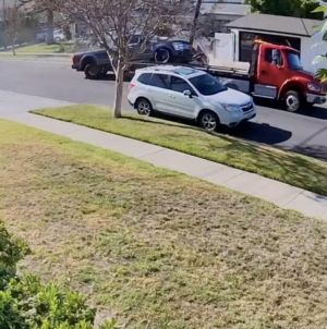 Tow truck driver’s spectacular fail caught on doorbell camera