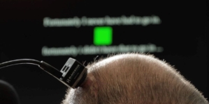 Paralyzed man speaks and sings with AI brain-computer interface