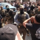 Chokeholds, bikers, ‘roving patrols’: Are Trump’s ICE tactics legal?