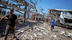 At least 74 killed as Israeli forces strike a Gaza cafe and fire on people seeking food, health officials say
