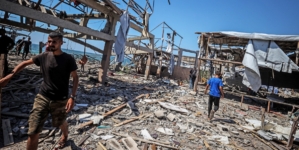 At least 74 killed as Israeli forces strike a Gaza cafe and fire on people seeking food, health officials say