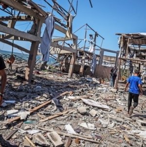 At least 74 killed as Israeli forces strike a Gaza cafe and fire on people seeking food, health officials say