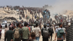 The food is just outside the border. But getting it to Gaza’s starving is a chaotic process
