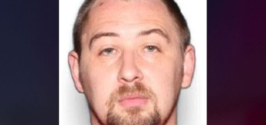 3 people charged amid search for suspect accused of killing 4 family members and abandoning baby