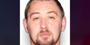 3 people charged amid search for suspect accused of killing 4 family members and abandoning baby