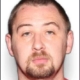 3 people charged amid search for suspect accused of killing 4 family members and abandoning baby