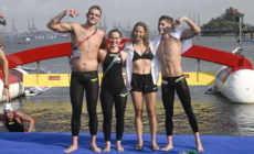 Open Water Swimmers Make History with Triple Podium Finish at World Championships