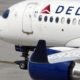 Pilot accused of child sex crimes is taken from cockpit minutes after flight lands in California