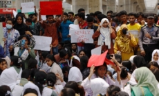 Grief and anger in Bangladesh as death toll from military training jet’s crash into school hits 31