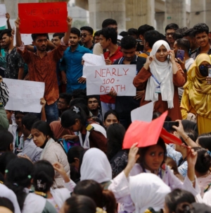 Grief and anger in Bangladesh as death toll from military training jet’s crash into school hits 31
