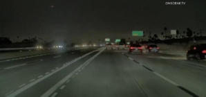 Video: Sparks fly in dramatic crash on L.A. freeway
