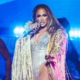 JLo suffers wardrobe malfunction as gold sequined skirt drops during show