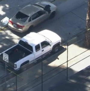 Shooter at large after man found dead inside car near Whittier school
