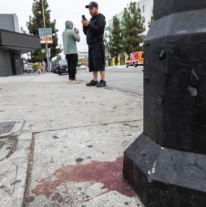Driver rammed into crowd outside Hollywood club, then was shot. Alleged shooter now under arrest