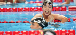 China’s swimming prodigy draws global praise and a note of caution