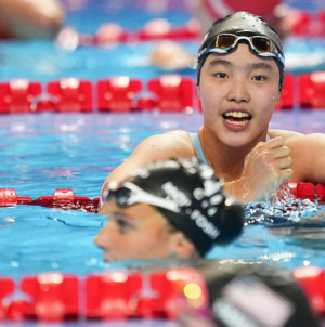 China’s swimming prodigy draws global praise and a note of caution