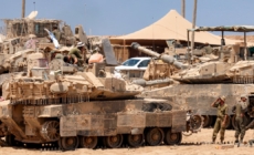 Satellite images show Israel building up forces for a possible ground invasion of Gaza, sources say