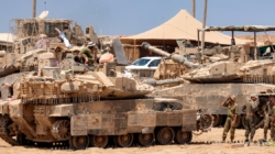 Satellite images show Israel building up forces for a possible ground invasion of Gaza, sources say