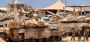 Satellite images show Israel building up forces for a possible ground invasion of Gaza, sources say