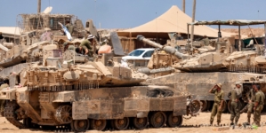 Satellite images show Israel building up forces for a possible ground invasion of Gaza, sources say