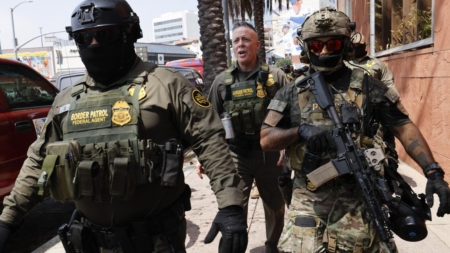 Commentary: Against the backdrop of the Hollywood sign, the Border Patrol takes a hellaweird group photo