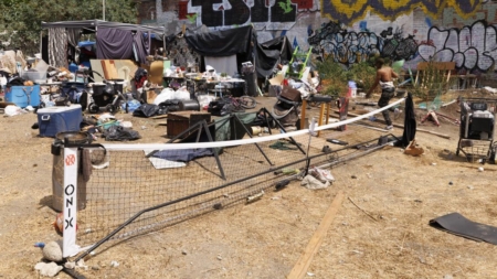 A Koreatown homeless encampment, with pickleball court and garden, is removed following complaints
