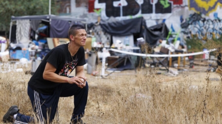 A homeless encampment, with pickleball court and garden, becomes both refuge and scourge