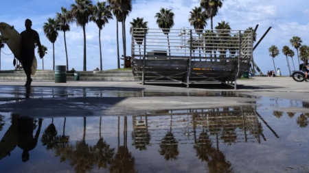 Southern California will remain muggy, with a chance for rain