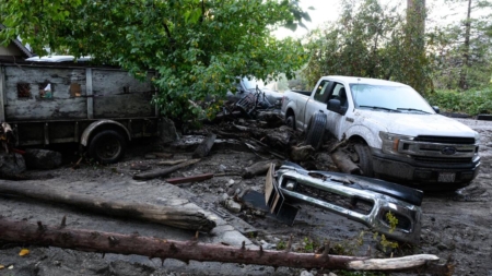 ‘The guy barely hung on when the the mud came through.’ Rain, mudslides batter SoCal mountain towns.