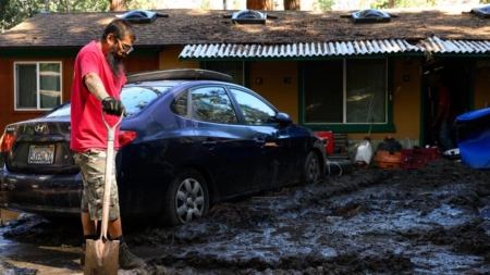 Aftermath of late summer storm includes destroyed homes, a closed highway and a child death