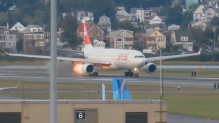 Flight departing from Boston puts on the brakes after spitting out flames