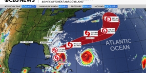 Tropical Storm Imelda nearing hurricane strength. Maps show it hurrying toward Bermuda.