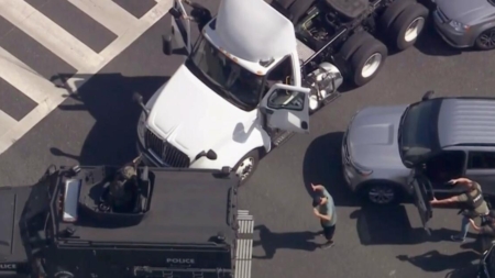 Armored vehicle rams suspected stolen big rig in dramatic police pursuit