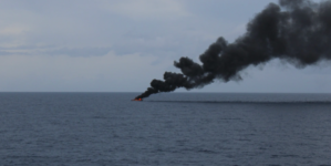 Coast Guard seizes over $220 million worth of cocaine, releases image of alleged drug boat on fire