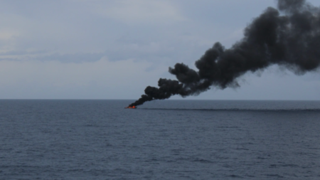 Coast Guard seizes over $220 million worth of cocaine, releases image of alleged drug boat on fire