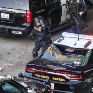 Feds charge 12 in alleged arson, attacks during immigration protests