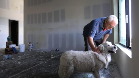He might be the first one to rebuild a house in Altadena, and he credits his golden retriever