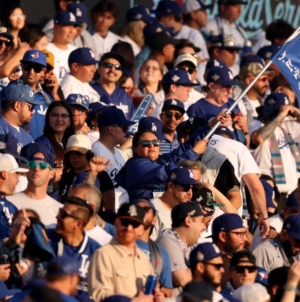For some L.A. Latinos, ICE raids tested their Dodgers faith. Can the World Series bring them back?
