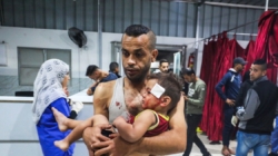 Israel says Gaza ceasefire back on after more than 100 reported killed in strikes